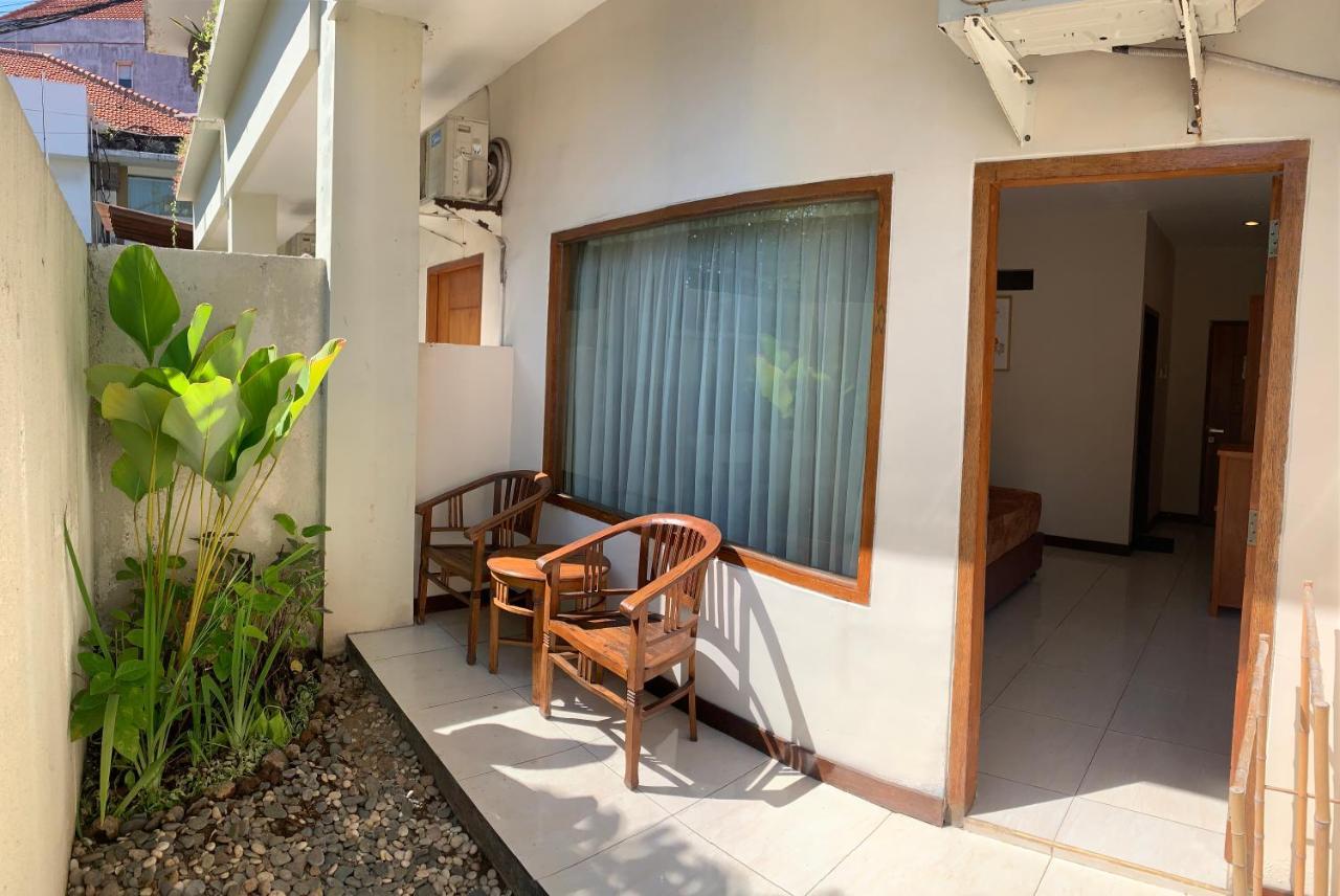 Kuta Suci Guesthouse Exterior photo